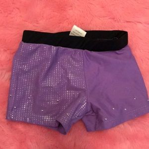 Purple and black leotard shorts, size 4/5